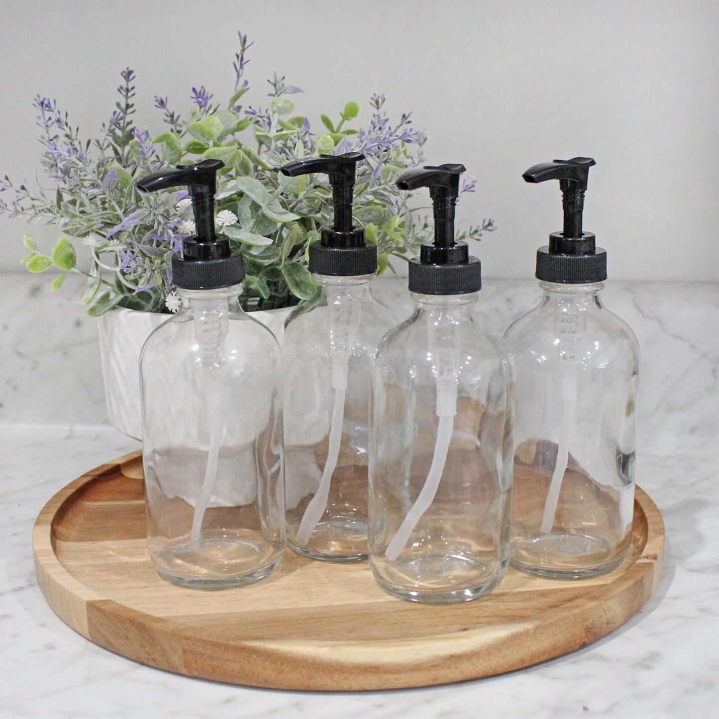 Cornucopia Brands 8oz Clear Glass Pump Bottles (4-Pack w/Black Plastic Pumps), Great as Essential Oil Bottles, Lotion Bottles, Soap Dispensers, and More