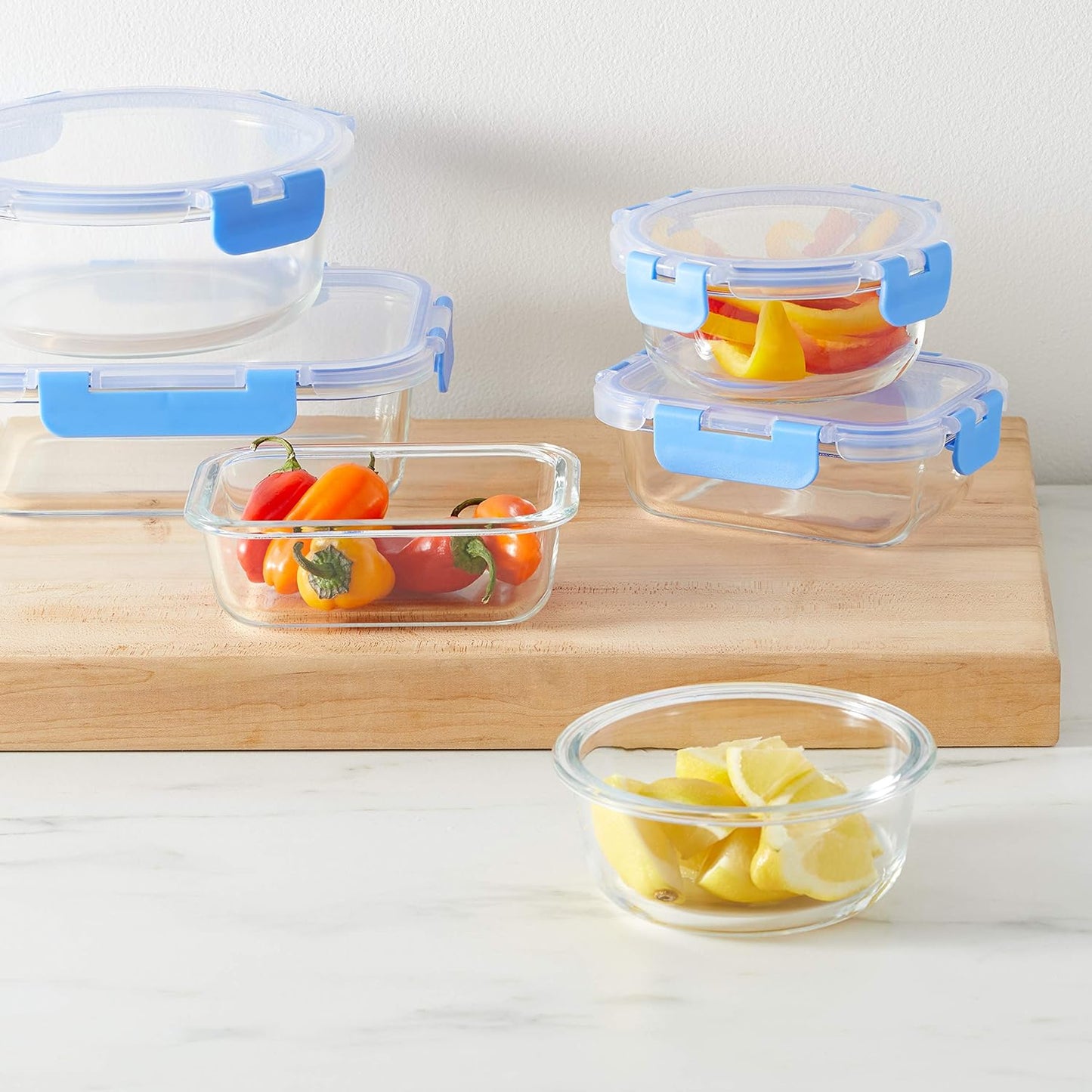 Amazon Basics Glass Food Storage Containers with Locking Lids, Set of 7, 14 pieces including lids, BPA-Free, clear with blue silicone ring